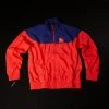 Jordan Legacy Tinker Story Windbreaker (Infrared/Violet) APPAREL