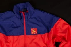 Jordan Legacy Tinker Story Windbreaker (Infrared/Violet) APPAREL