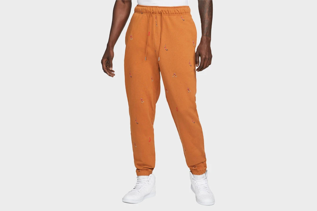 New Arrivals Jordan Essentials Printed Fleece Pants (Brown) 2 New Arrivals Jordan Essentials Printed Fleece Pants (Brown)